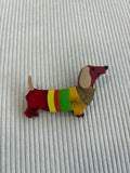 BROCHE  SALCHI  ROJO