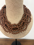 COLLAR BABERO MARRON