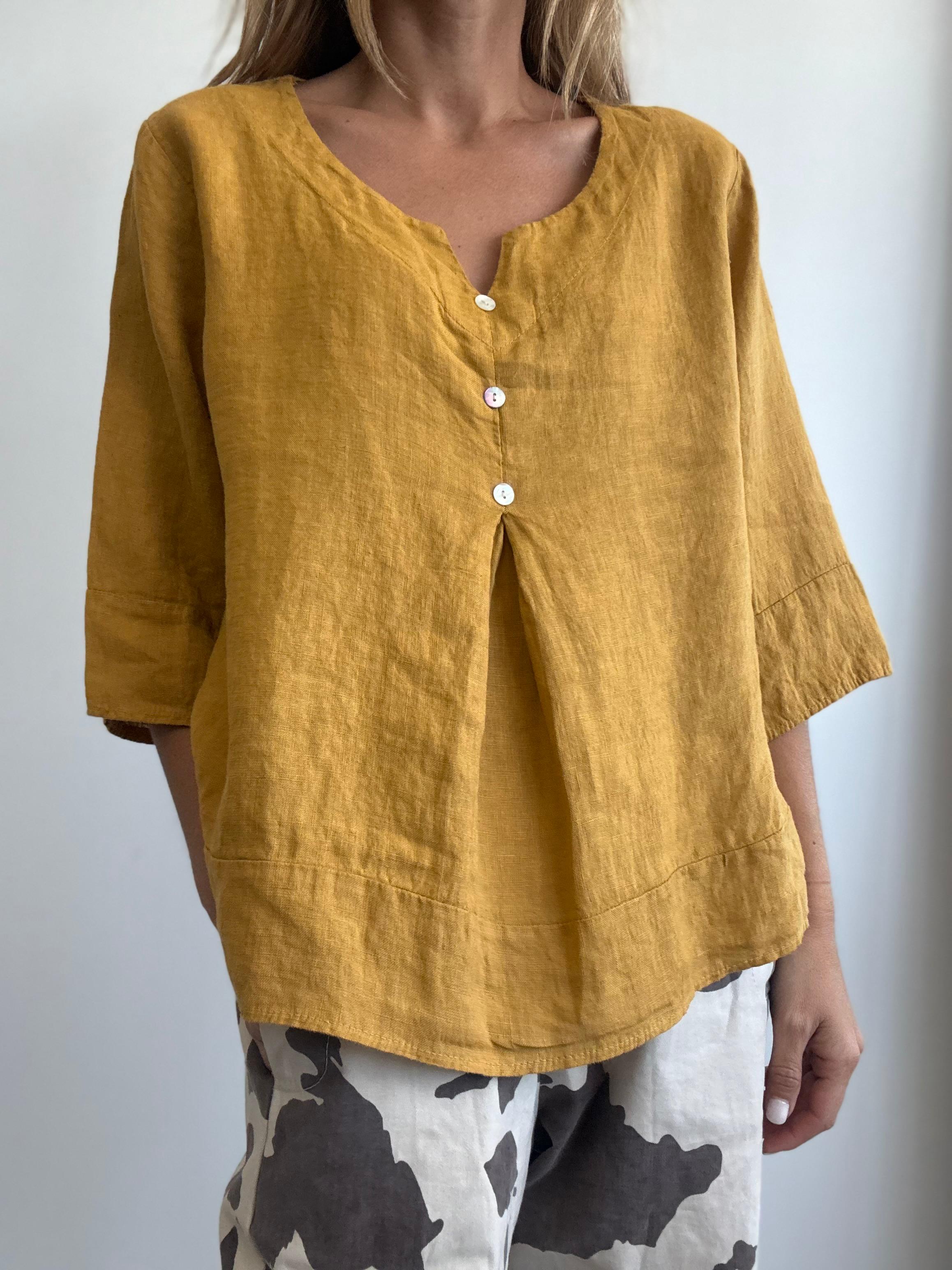 BLUSA LEÓN MOSTAZA