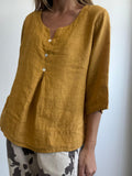 BLUSA LEÓN MOSTAZA
