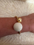 PULSERA DOS BOLAS MARFIL-DORADO