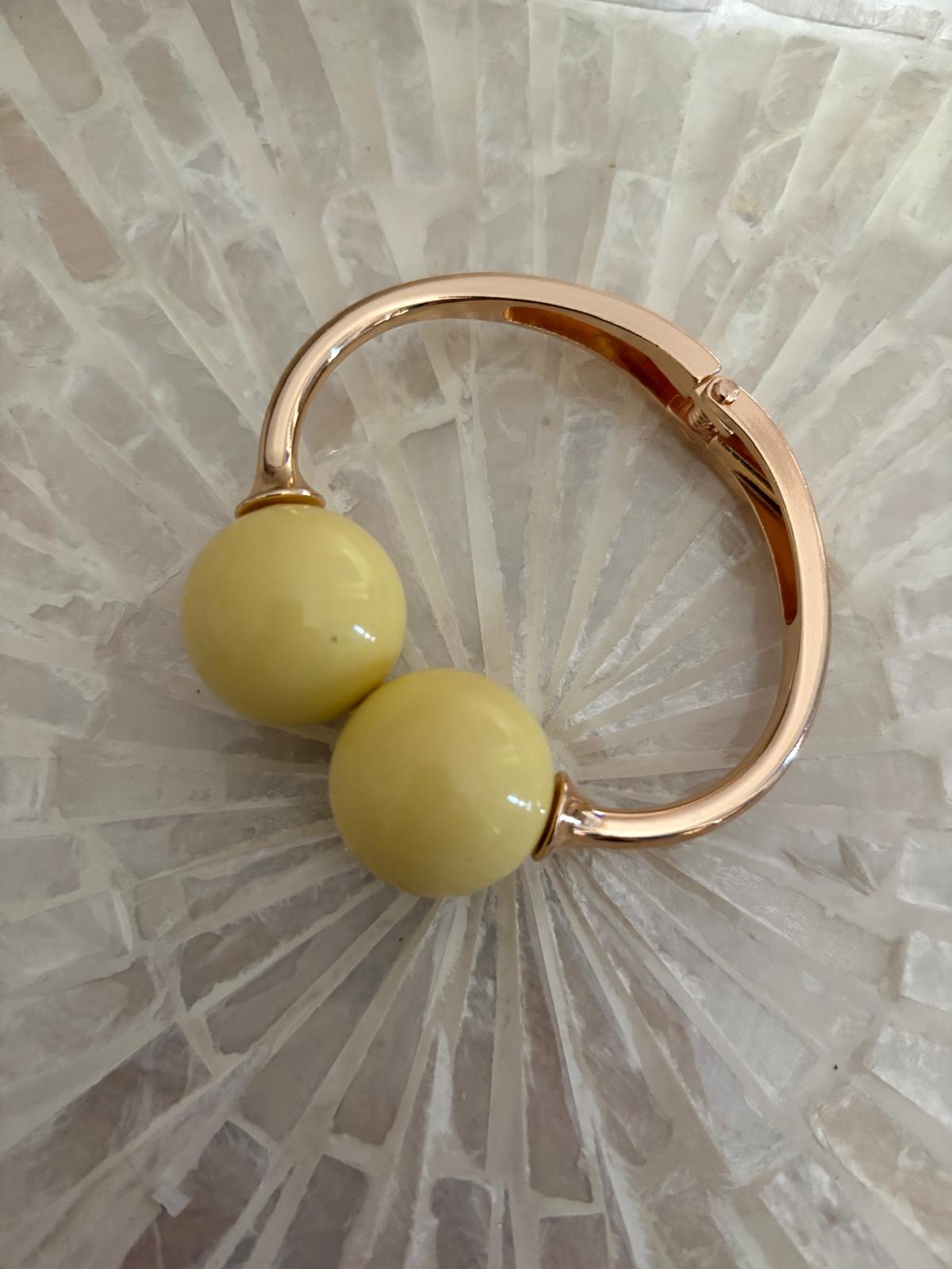 PULSERA DOS BOLAS  AMARILLO