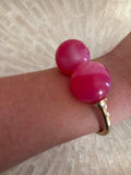 PULSERA DOS BOLAS  FUCSIA